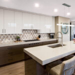 Gray and white gloss kitchen cabinets