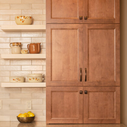 Warm stained and white kitchen cabinets