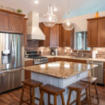 Warm stained and white kitchen cabinets