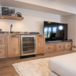 Entertainment center with tv and wine cooler in maple Cashew