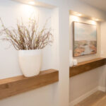 Mantle shelves in a hallway