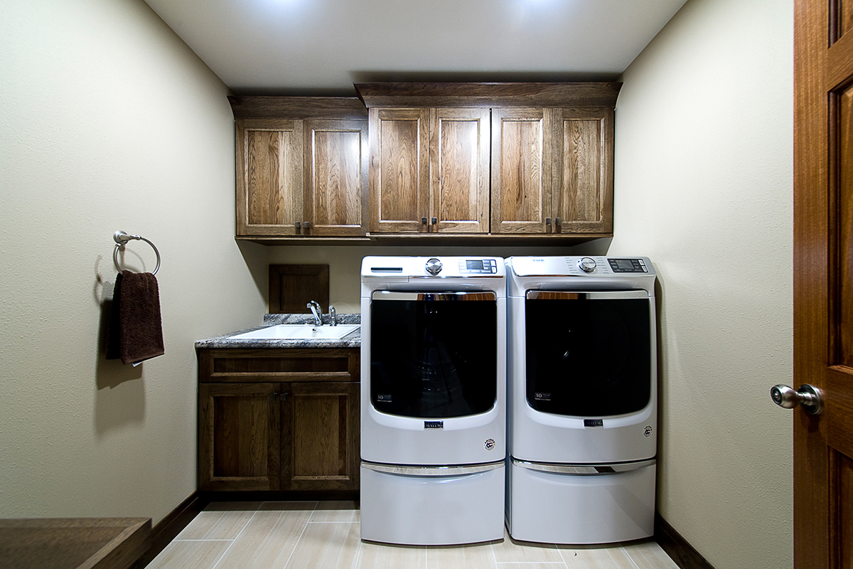 Dark stained Mud room cabinets