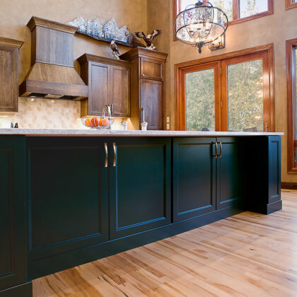 Navy and Dark stained kitchen cabinets