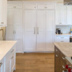 White and dark stained kitchen cabinets
