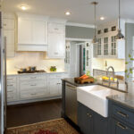 navy and white kitchen cabinets