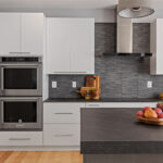 Gray and white kitchen cabinets