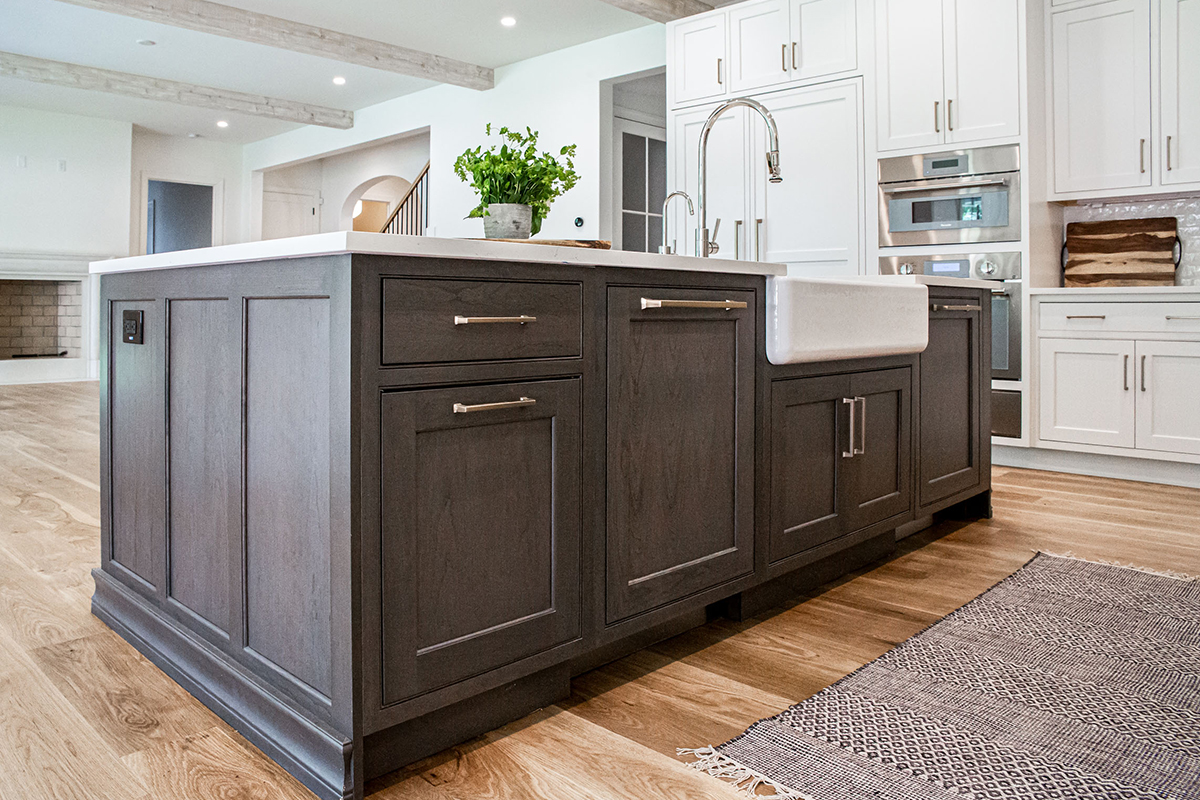 dark stained and White kitchen cabinets