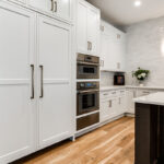 dark stained and White kitchen cabinets