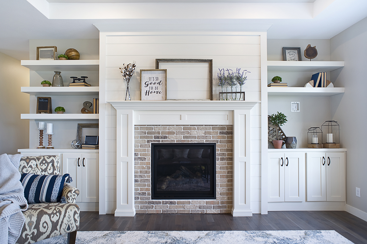 White living room and fireplace mantel