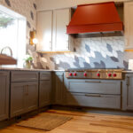 Red, white and gray kitchen cabinets