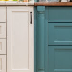 White and teal kitchen cabinets