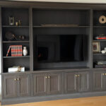 Dark stained entertainment center cabinets