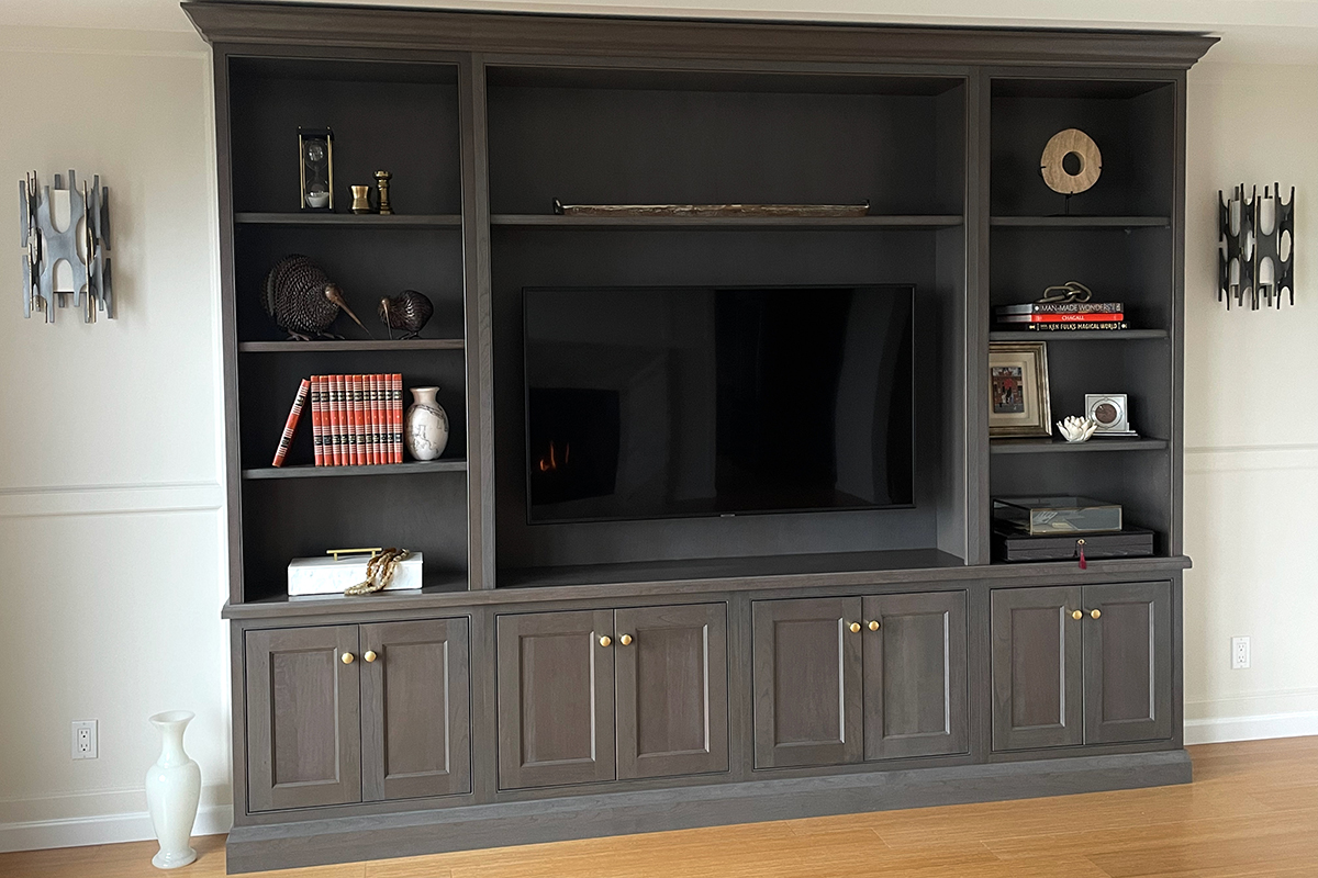Dark stained entertainment center cabinets