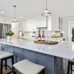 Blue island and White kitchen cabinets