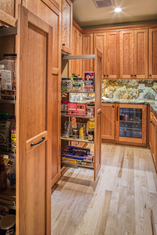 warm stained pantry cabinets