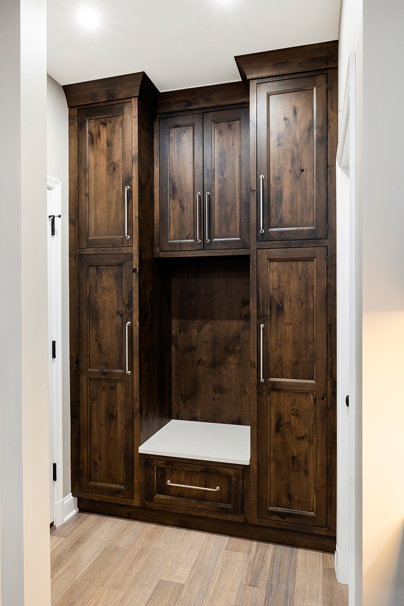 Brown stained pantry cabinets