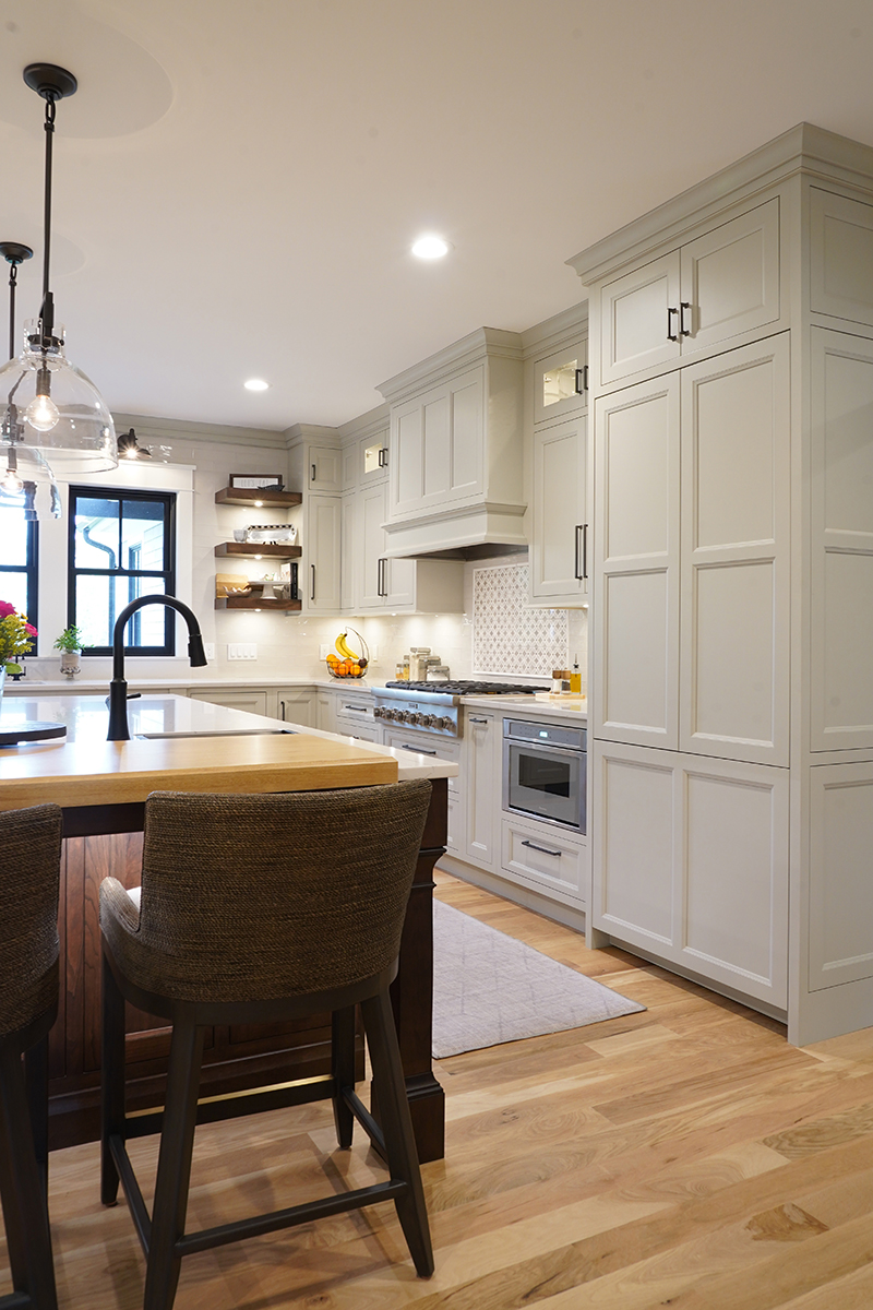 Brown stained and white kitchen cabinets