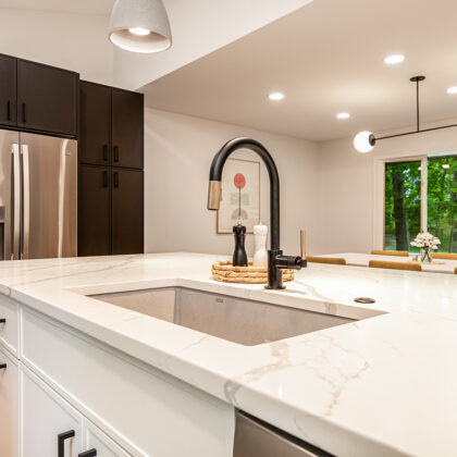 Natural stained, black and white kitchen cabinets