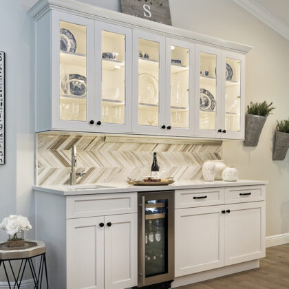 White stained kitchen cabinets