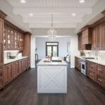 Brown stained and white kitchen cabinets