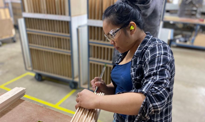 Woman building door