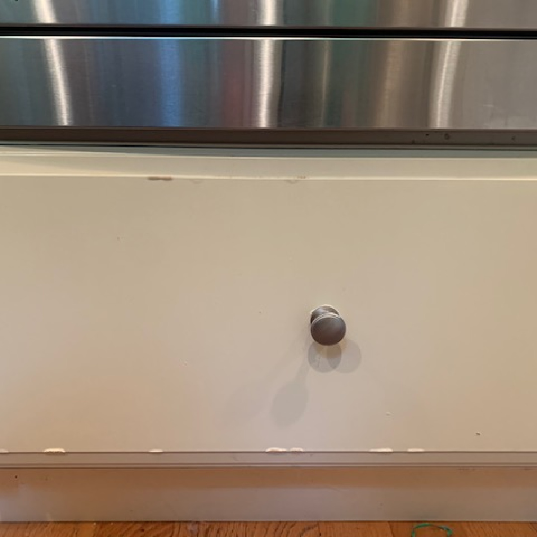 Image of Water Damage on cabinet drawer front