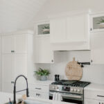 Another angle of the white cabinets with the white ceiling feature.