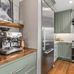 mint green kitchen with separate coffee bar