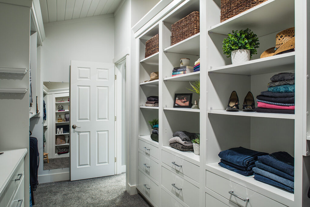 Elegant Walk-In Closet - Showplace Cabinetry