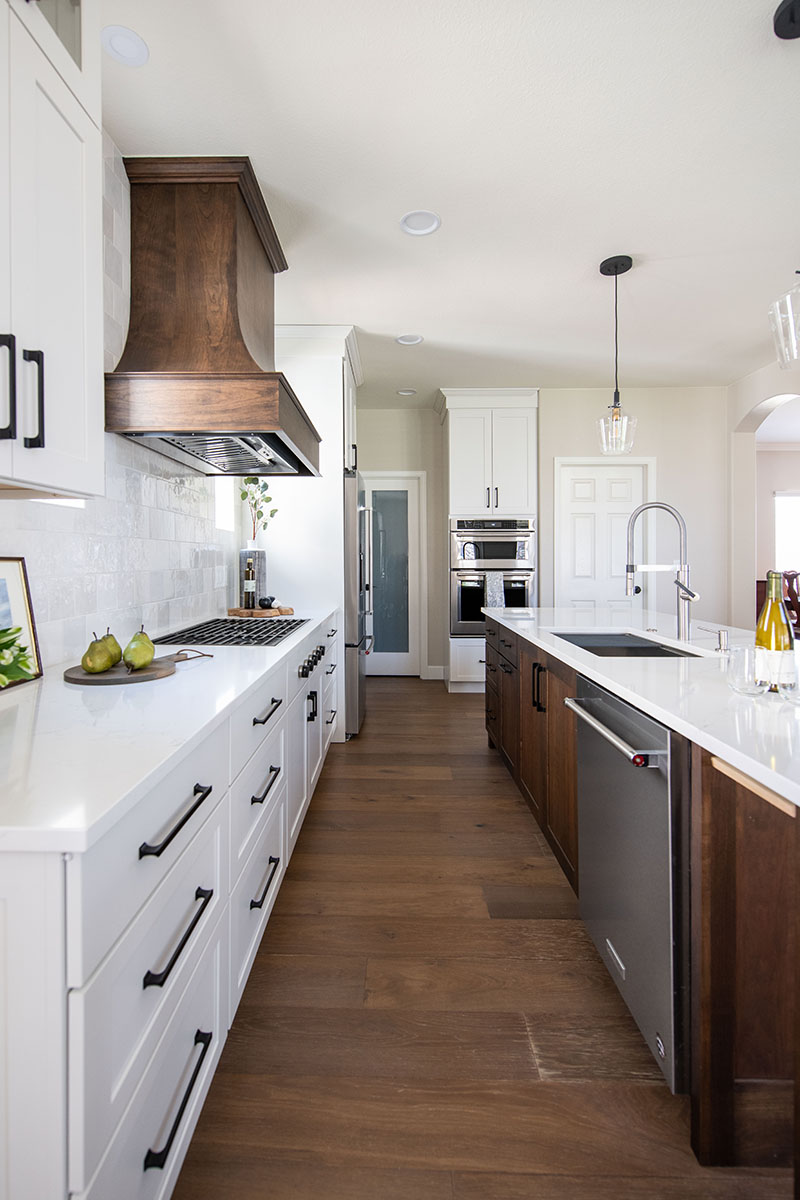 White Paint Grade Cabinets Surround Cherry Kitchen Island