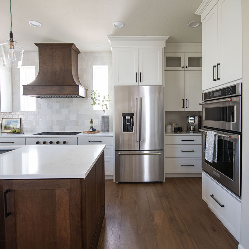 White Paint Grade Cabinets Surround Cherry Kitchen Island