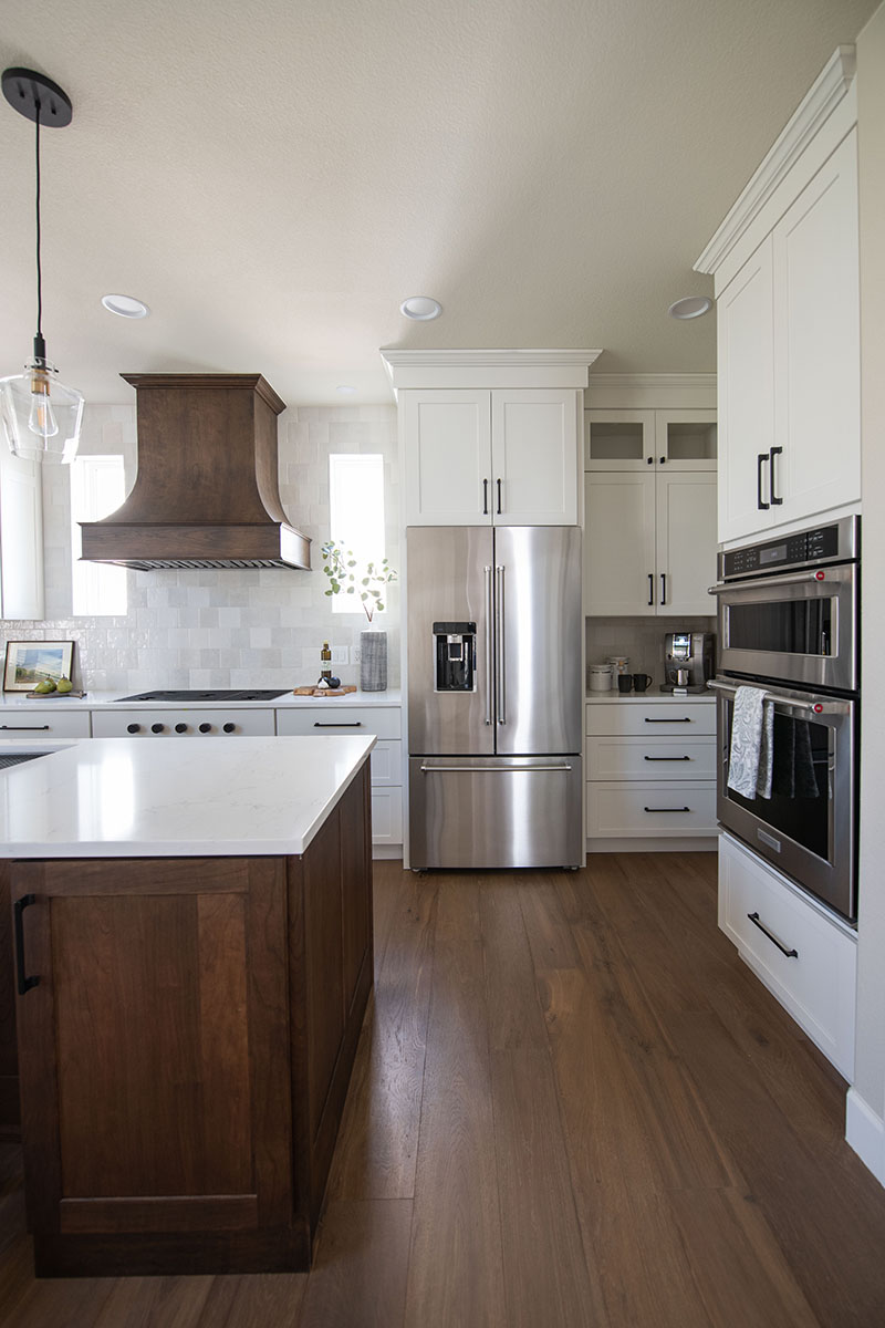 White Paint Grade Cabinets Surround Cherry Kitchen Island
