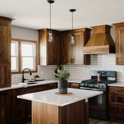 walnut cabinets with white accents in kitchen