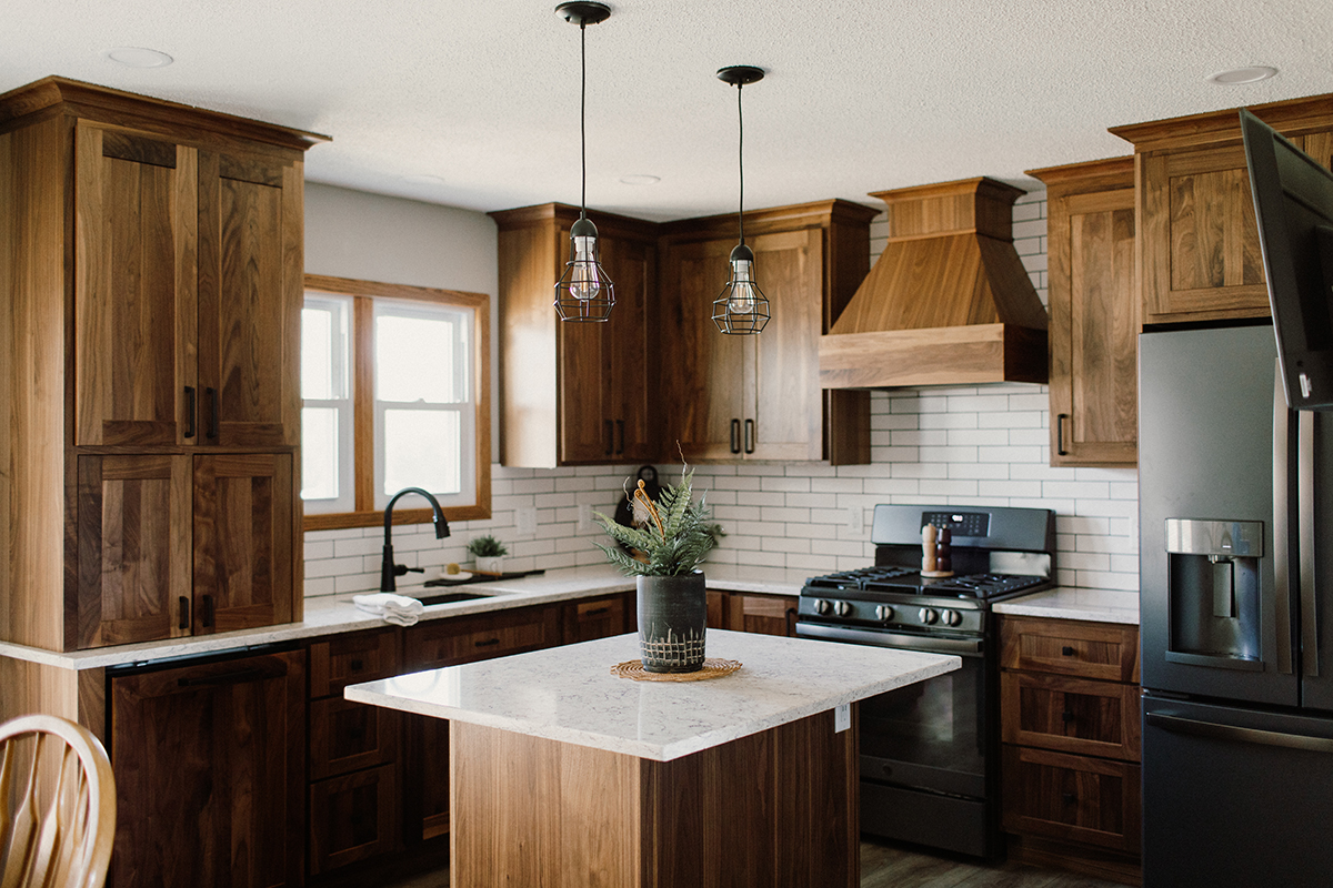walnut cabinets with white accents in kitchen