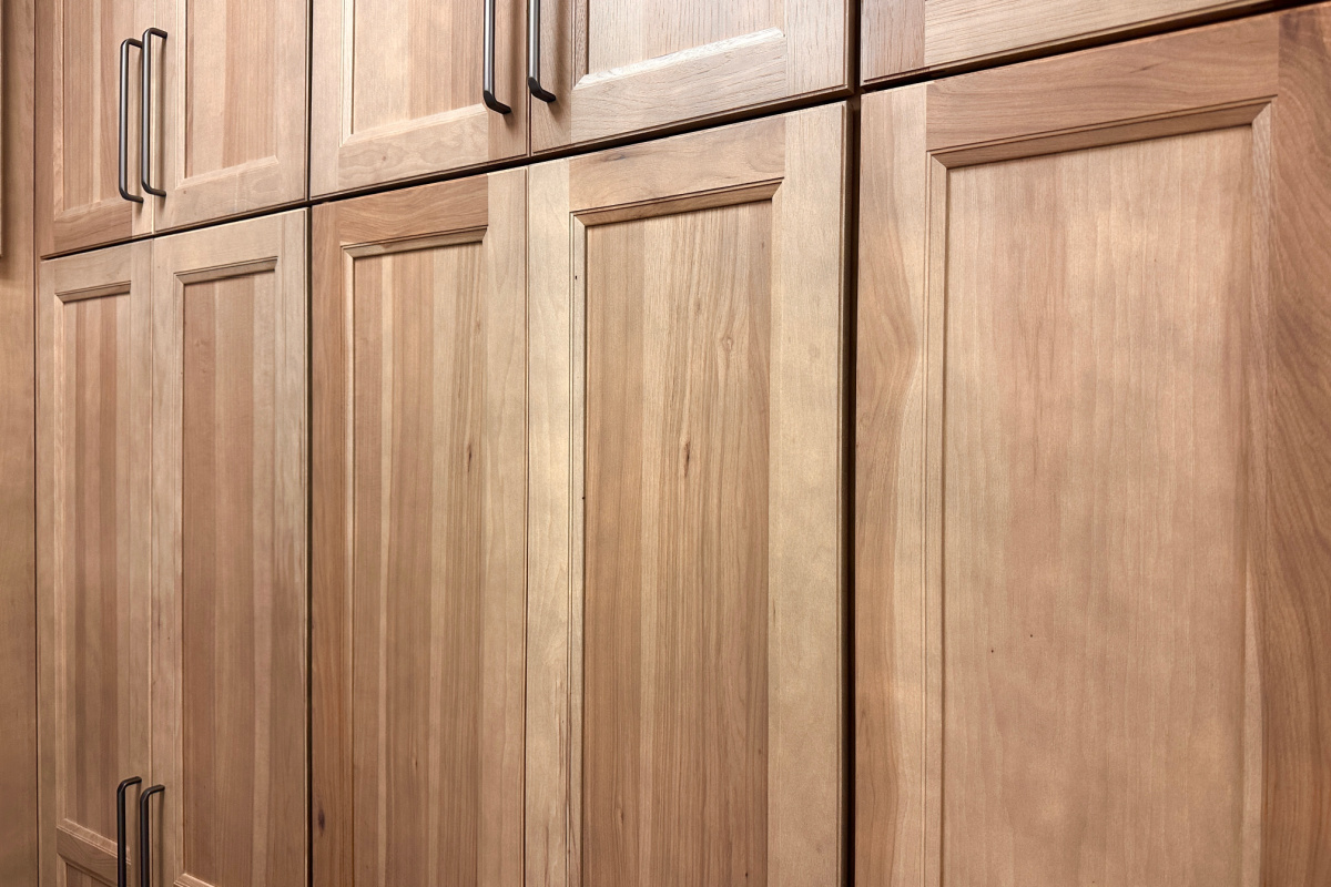 Hickory cabinet doors finished in Sparrow showing variability