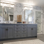 gray bathroom cabinetry with multicolored bathroom vanity
