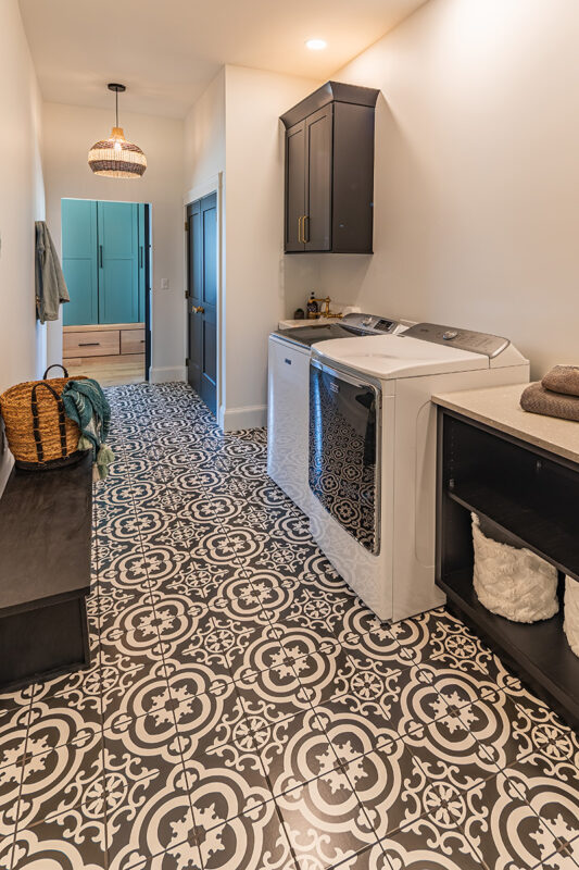 laundry room with unique floor pattern
