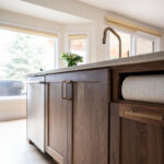 Painted kitchen with walnut island and hood