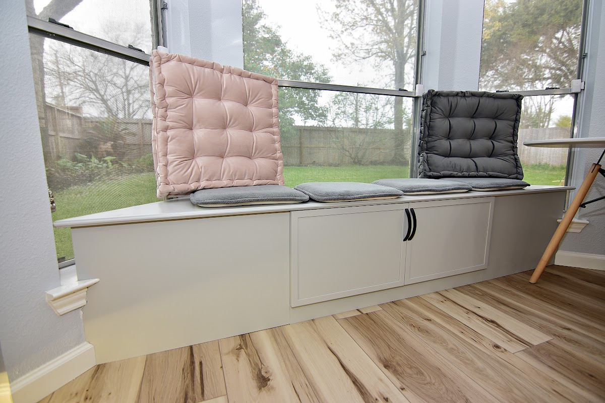 Gray window seat cabinet