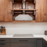 Walnut and painted Iron Ore kitchen cabinets