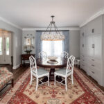 Simpli Gray painted cabinet storage in dining room