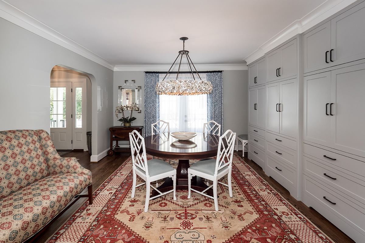 Simpli Gray painted cabinet storage in dining room