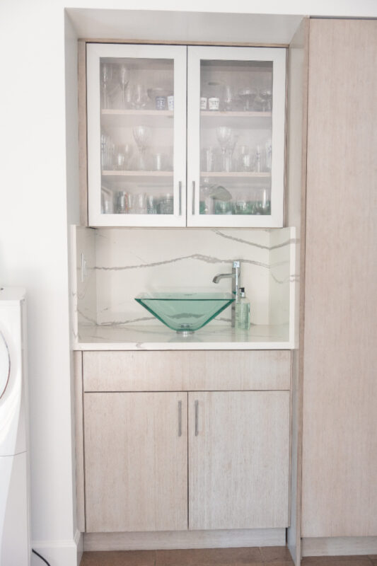 Stained bar cabinet with metal prep for glass wall cabinet