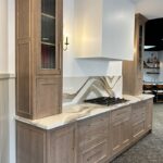 Stained cabinets with painted wood hood