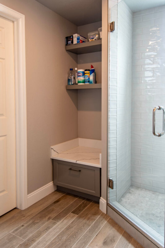 Painted bathroom bench seat and floating shelves