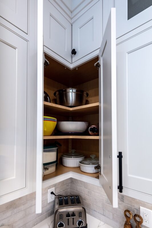 Painted kitchen cabinet with doors open