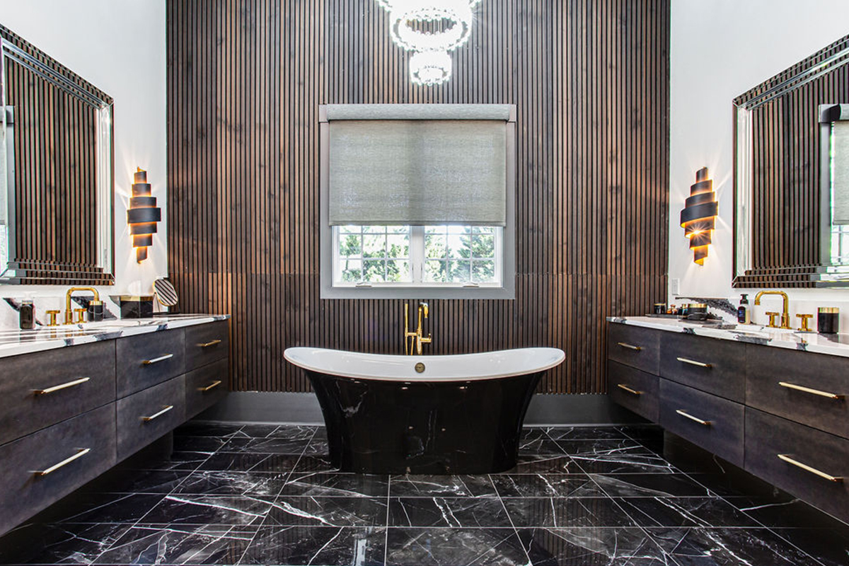 Stained master bath with floating vanities and free standing tub