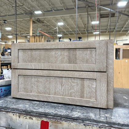 Two drawer floating vanity base stained in Montana