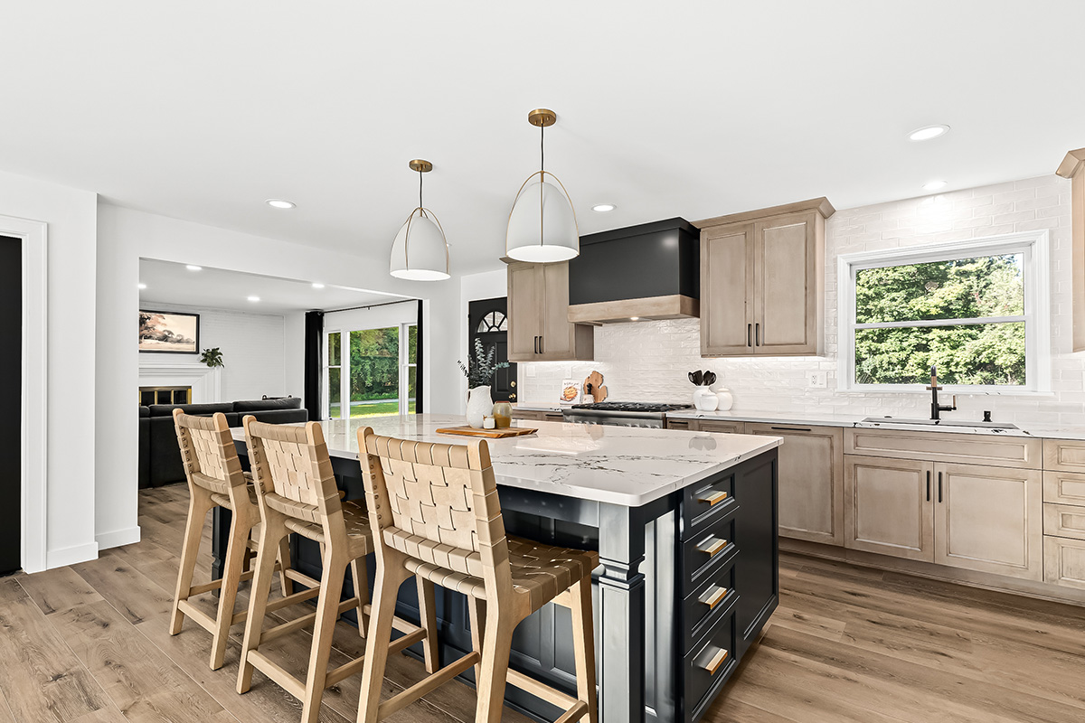 Stained kitchen cabinets with painted island