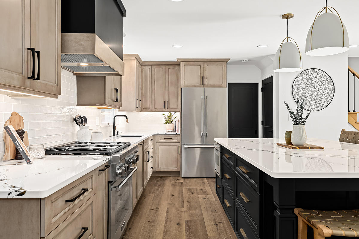 Stained kitchen cabinets with painted island